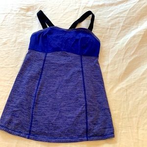 Blue activity wear with black straps. The brand is Lululemon